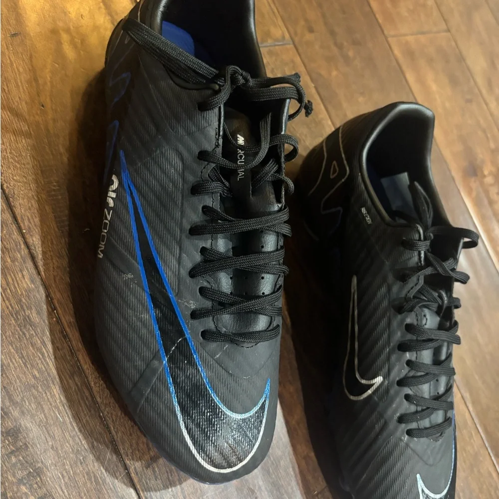 Nike Kids Black Soccer Cleats with Blue Accents